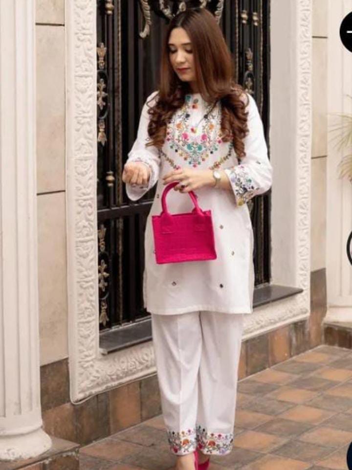 Elegant woman's 2pc suit shirt and trousers